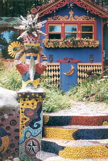 front view of left side of stairs approaching house